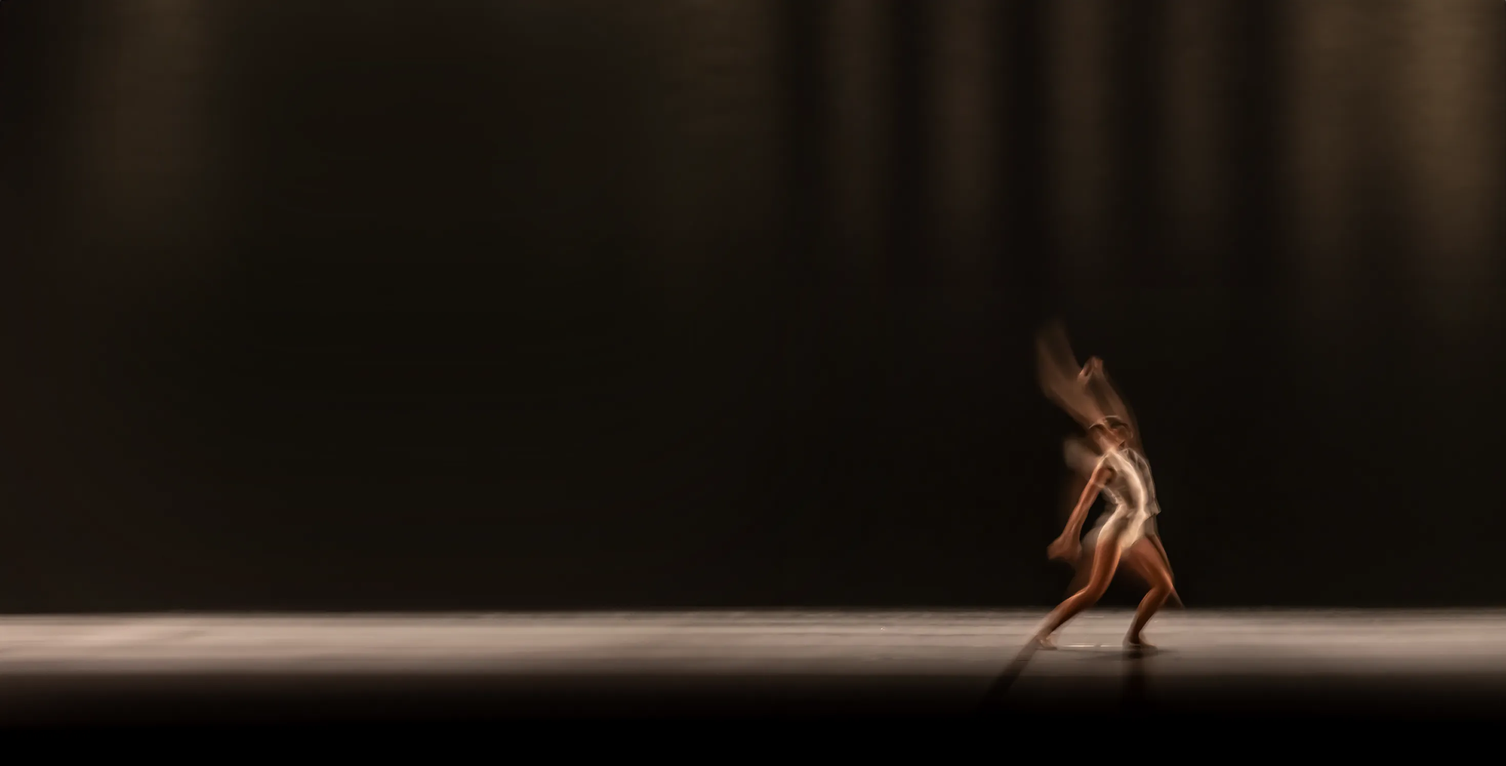The hero image for our performance media agency, showing a dancer's purposeful movement. This represents our results-driven approach to creating 'Media With Purpose'.