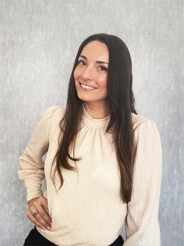 A professional portrait of Valentina Gris, Global Compliance Manager at Helios Worldwide